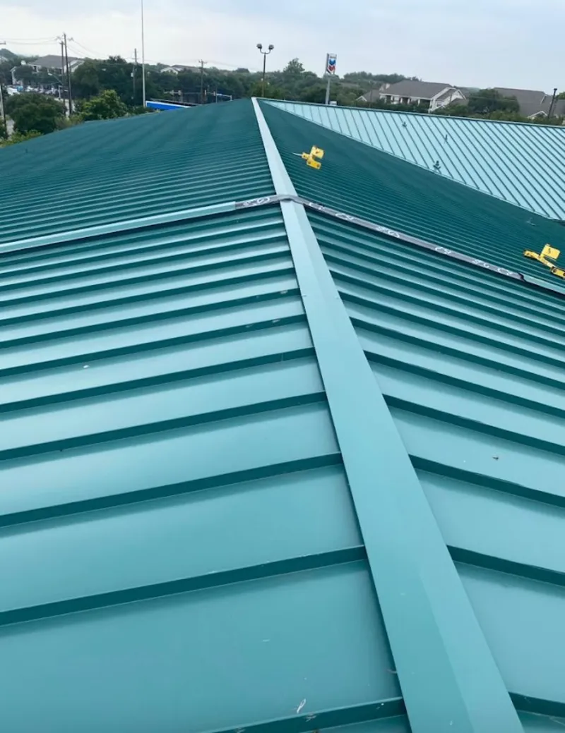 Green commercial metal roof ridge and valley for Metal Roof Repair in Dighton