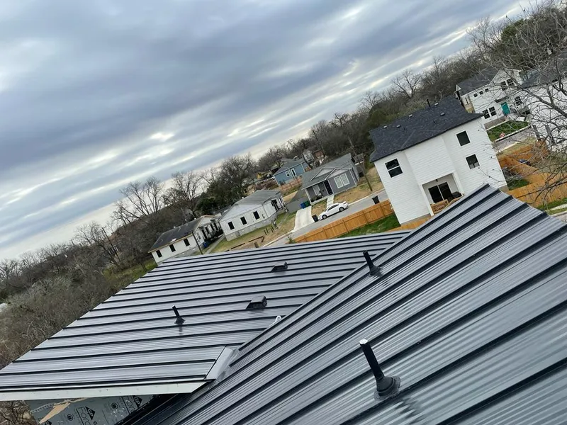 Standing seam metal roof panels with vents for Skylight Repair in Dighton